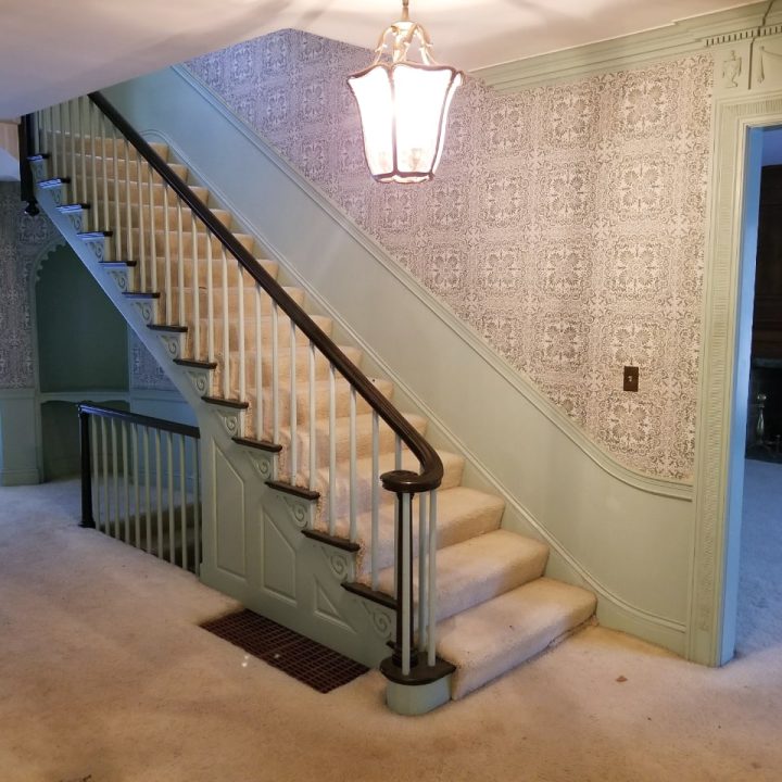 painted stairs with wallpaper